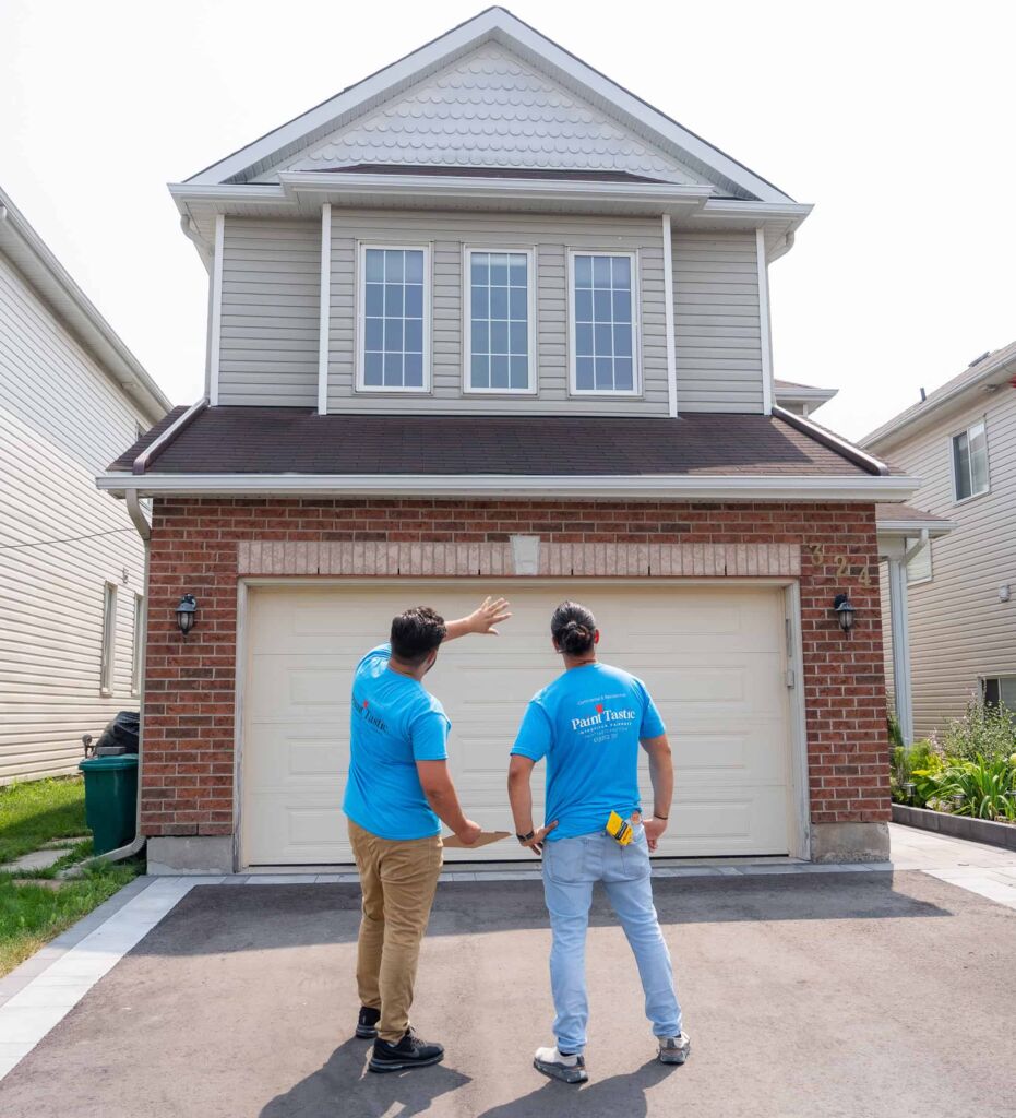Team Evaluating House for Exterior Painting